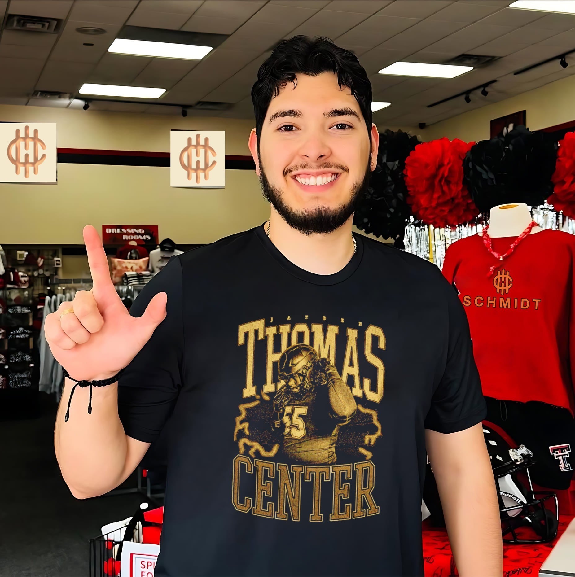 Jayden Thomas Center 55 football offensive lineman shirt
